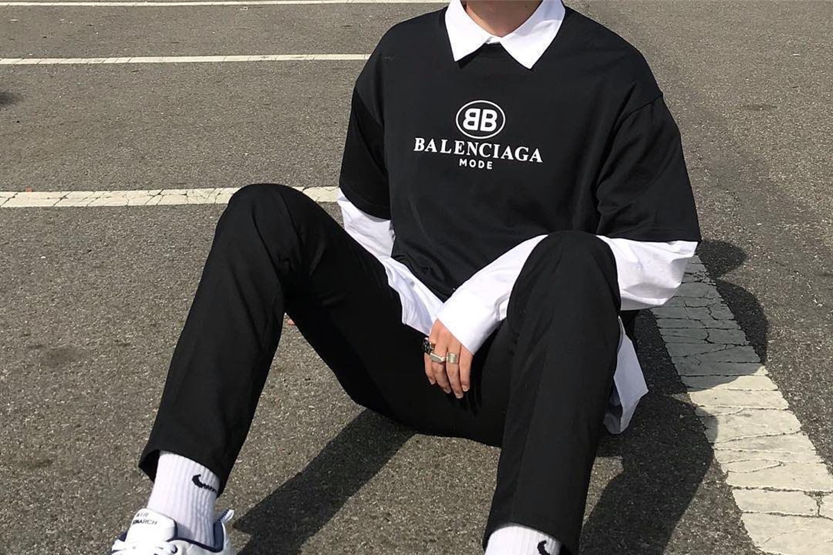 eboy sitting on the ground