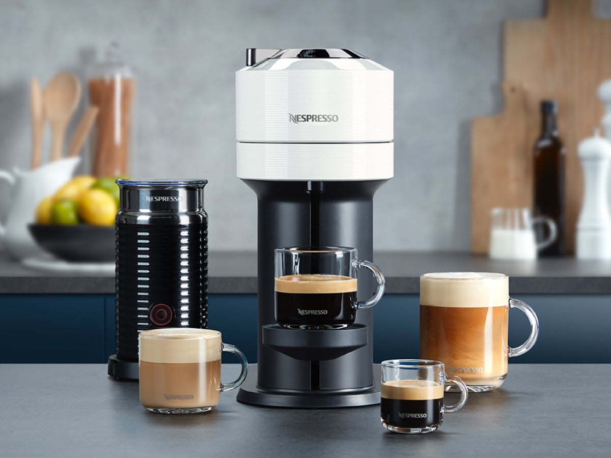 nespresso vertuo next coffee machine aeroccino bundle on table in kitchen