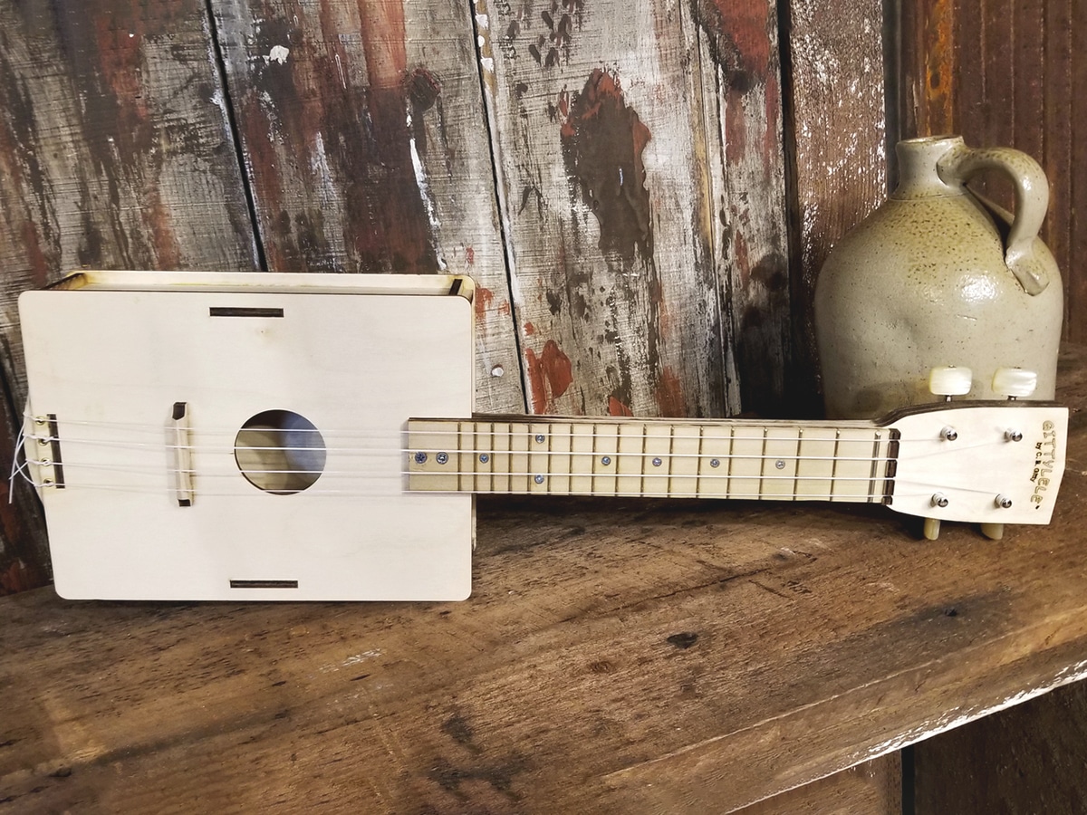 ukulele kitz on wooden table