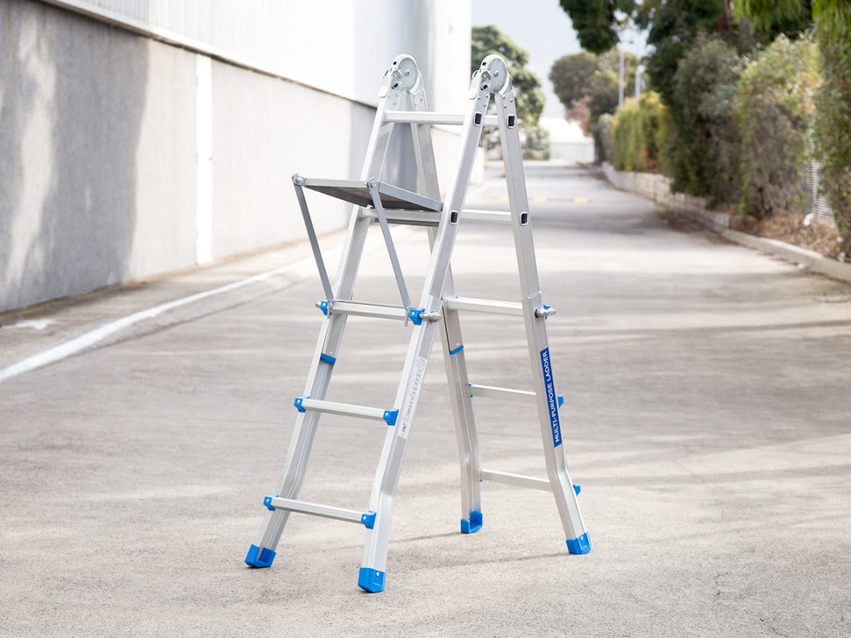 greenlund multi folding 4m ladder w platform standing on the street