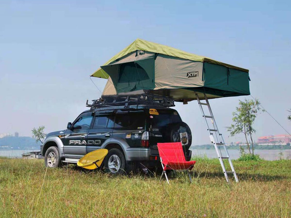 https://manofmany.com/wp-content/uploads/2021/10/40-Best-Camping-Gear-Essentials-Your-Next-Outdoor-Adventure-XTM-Rooftop-Tent.jpeg