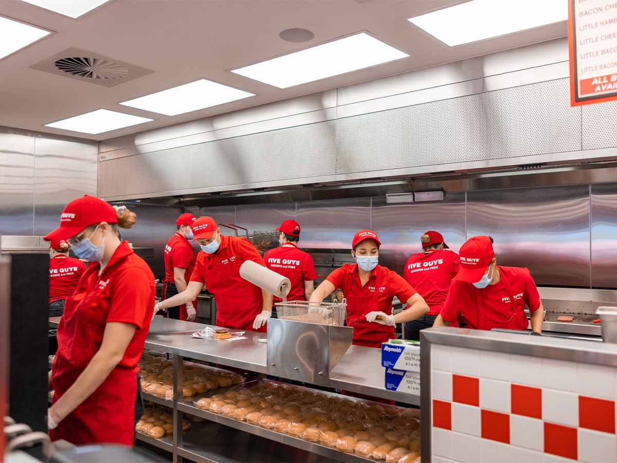 Five guys cooking