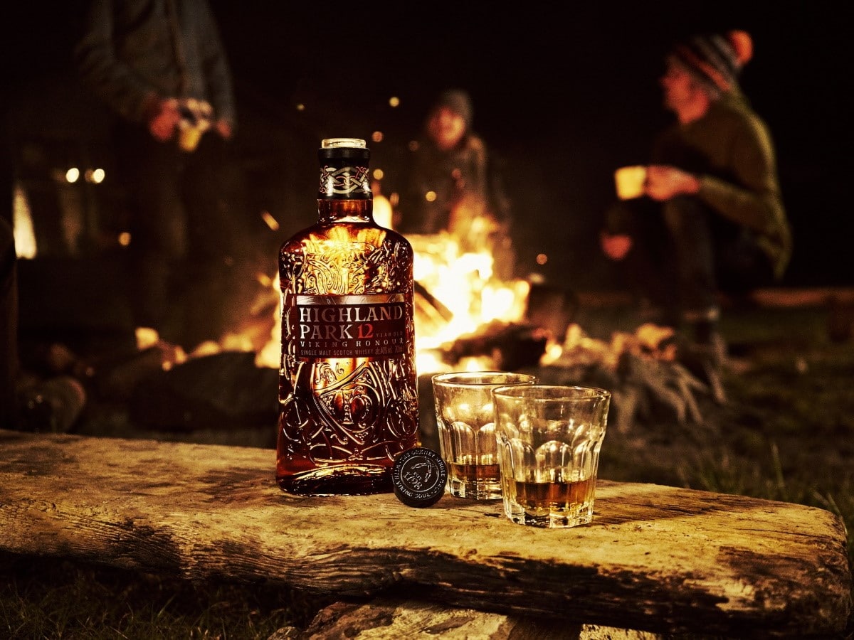 12yo lifestyle 3 two glasses on log campfire llr