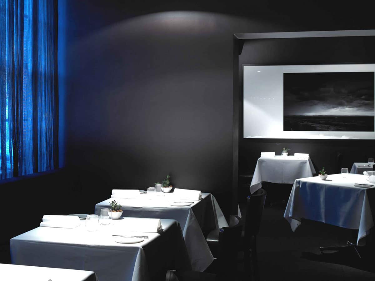 Interior of Attica restaurant with blue, black and white colour scheme