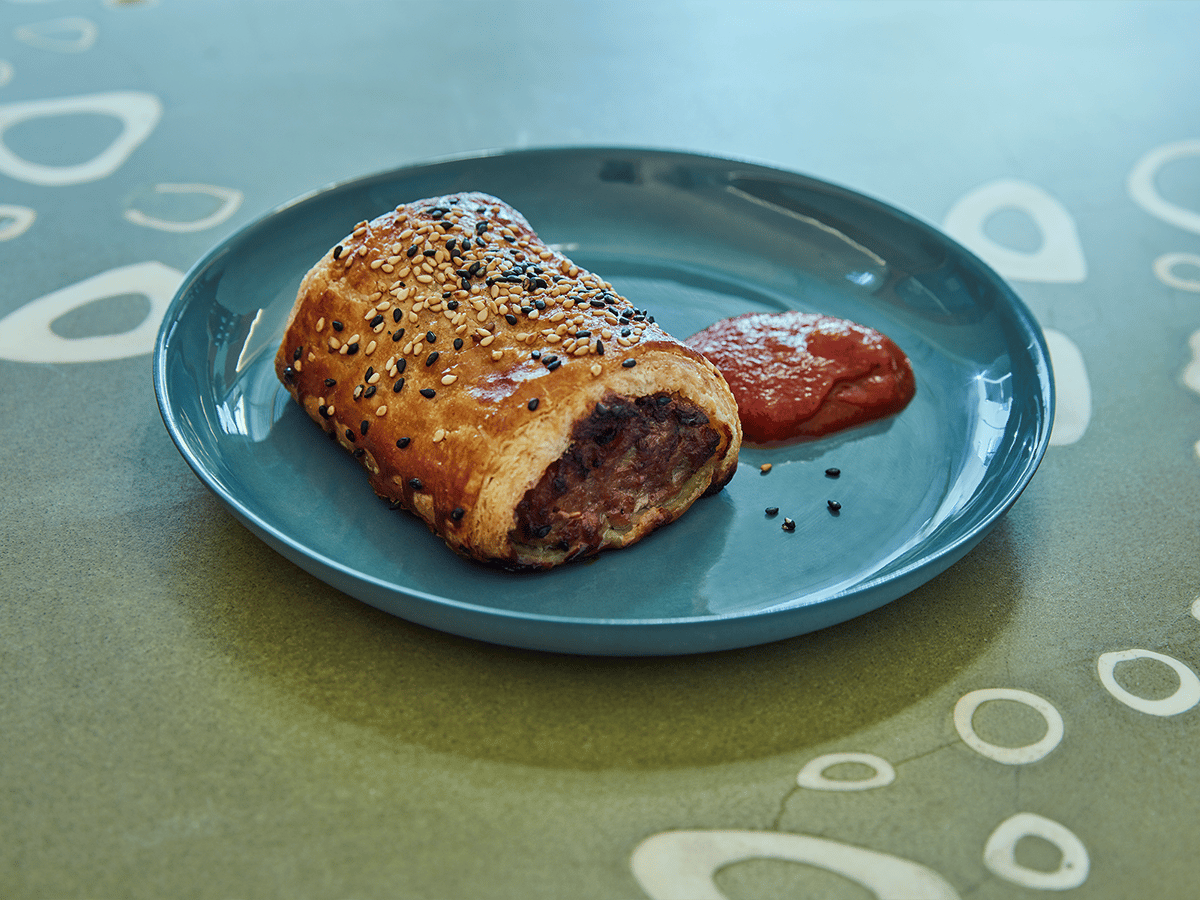 Feather and bone sausage roll