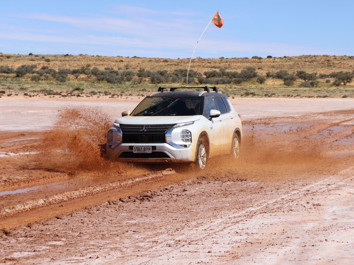 Mitsubishi outlander phev crossing mud 1