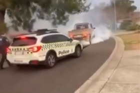 Burnout in front of cop