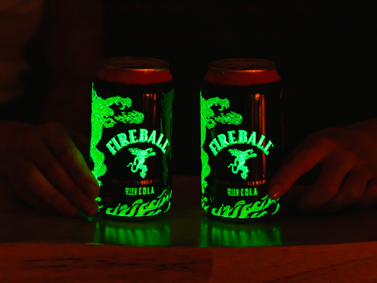 stay-lit-after-dark-with-fireball-whisky-s-glowing-premixed-cans-man