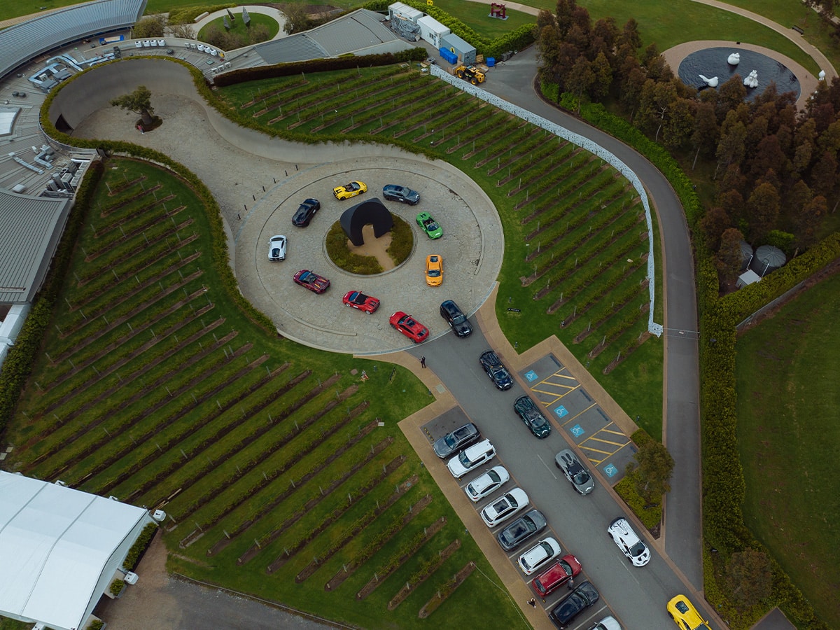 Pt leo estate with lamborghinis in convoy