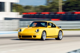Alois ruf at the concours club in miami yellowbird on racetrack