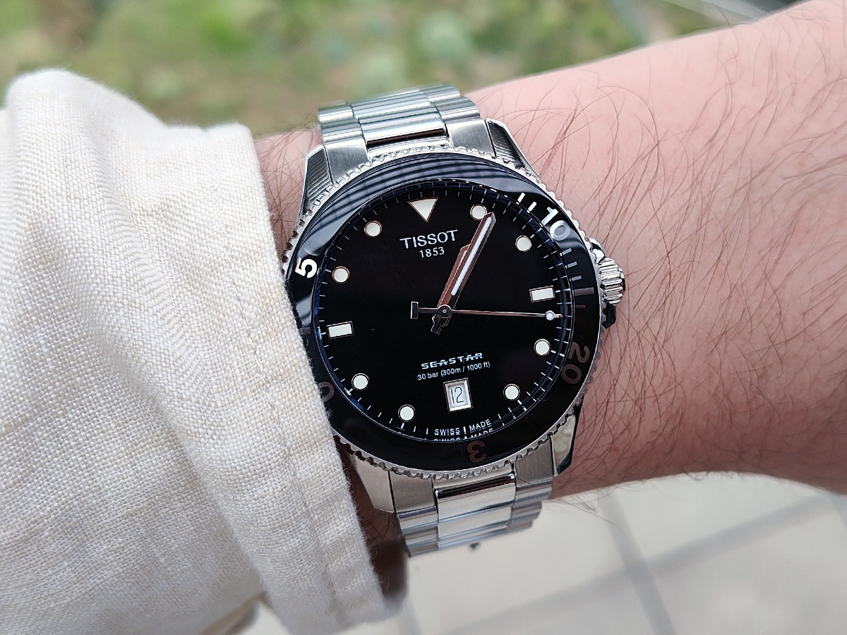 Tissot seastar 300m black dial on wrist