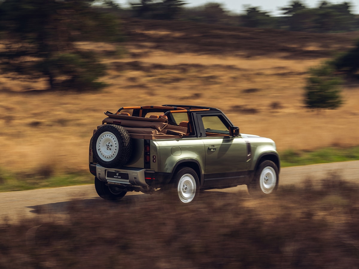 Land rover defender 90 convertible with roof down