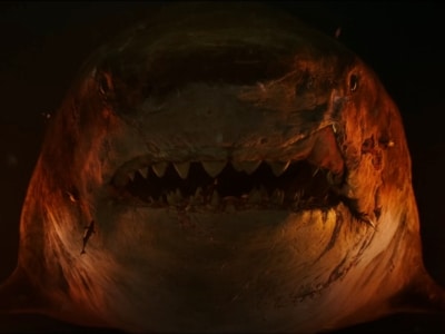 WATCH: Giant Sharks Munch on Hapless Swimmers in Jason Statham's 'Meg 2: The Trench'