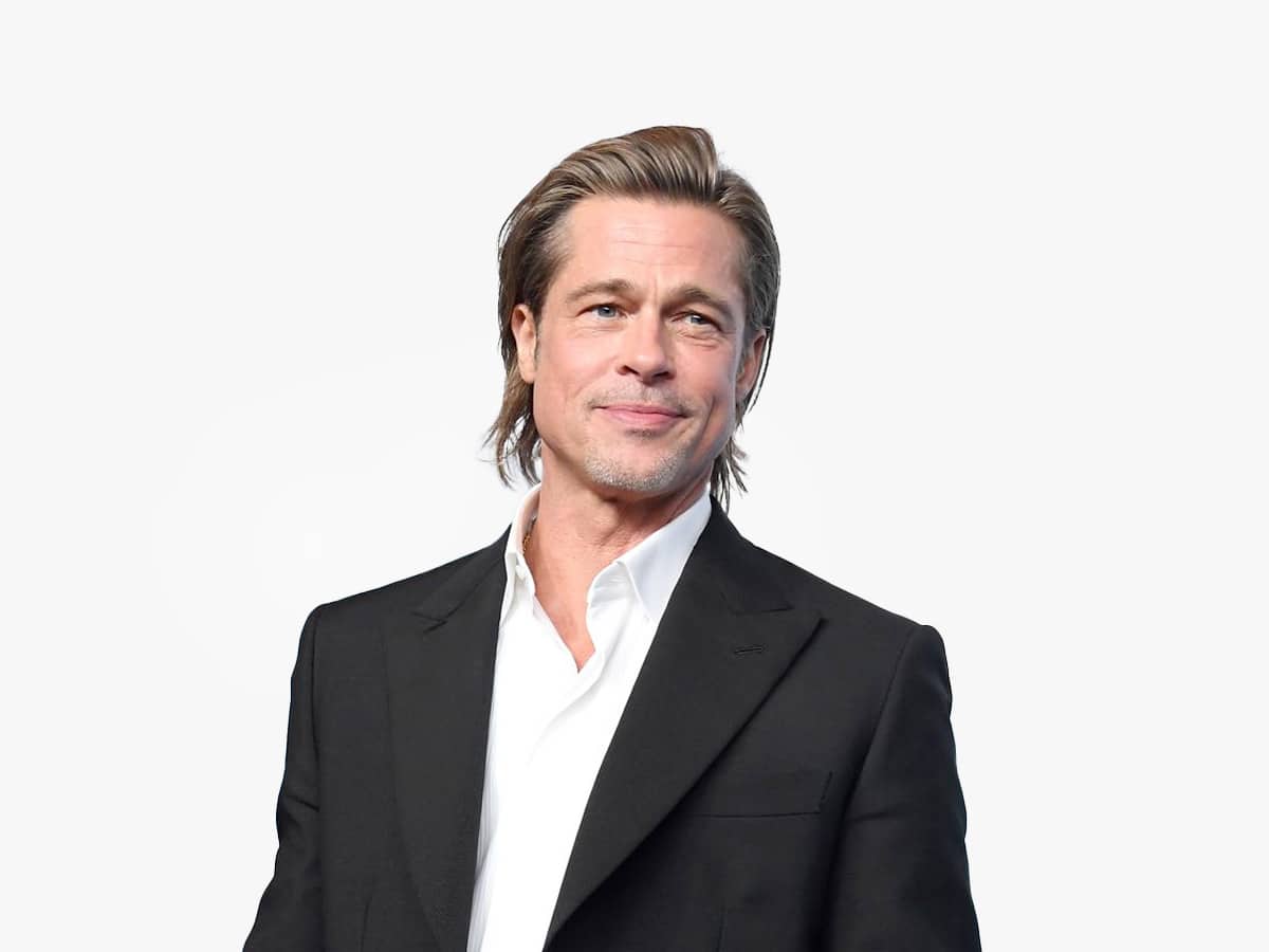 Brad Pitt with a slicked back medium length hairstyle | Image: Getty