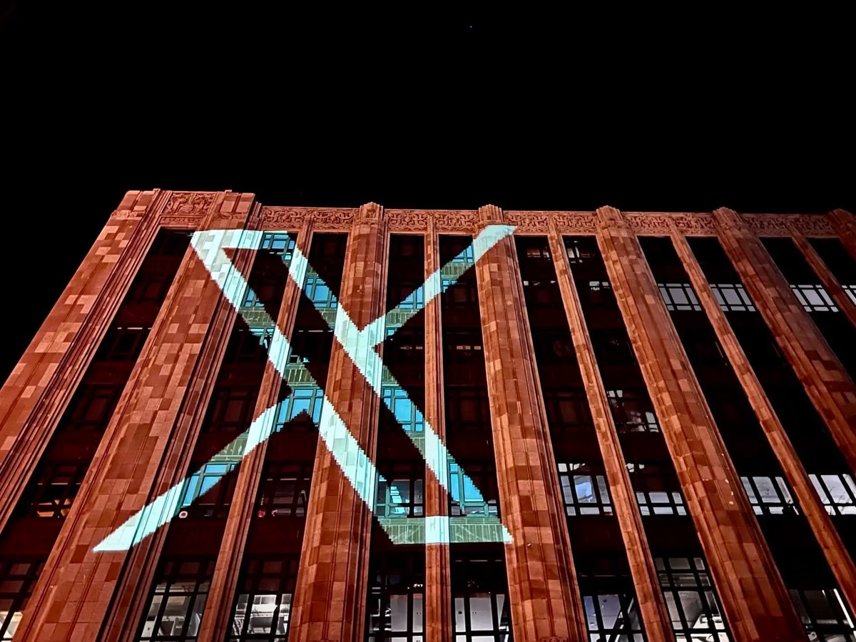 The new 'x' logo of twitter takes center stage at the company's office headquarters 