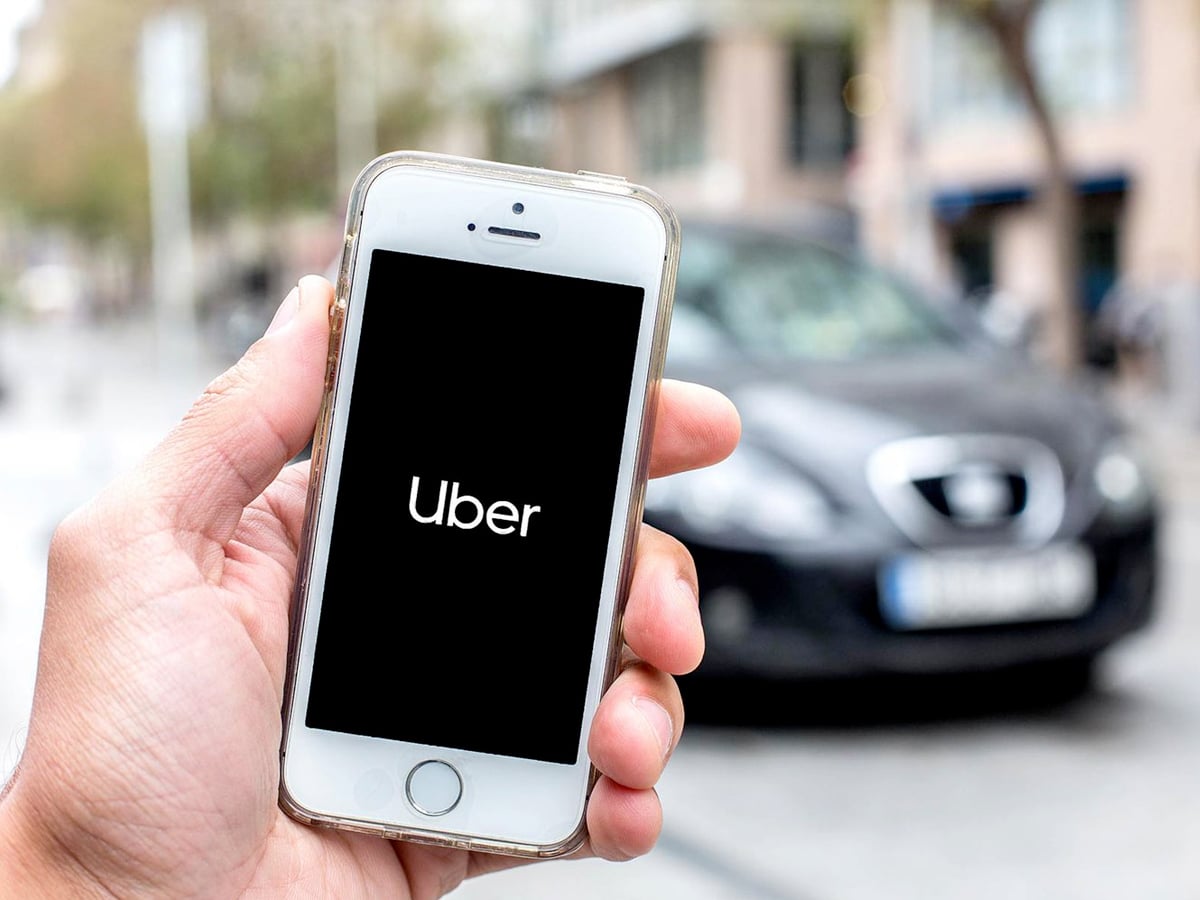 Uber app in use | Image: Thiago Prudencio/Sopa Images/Getty Images