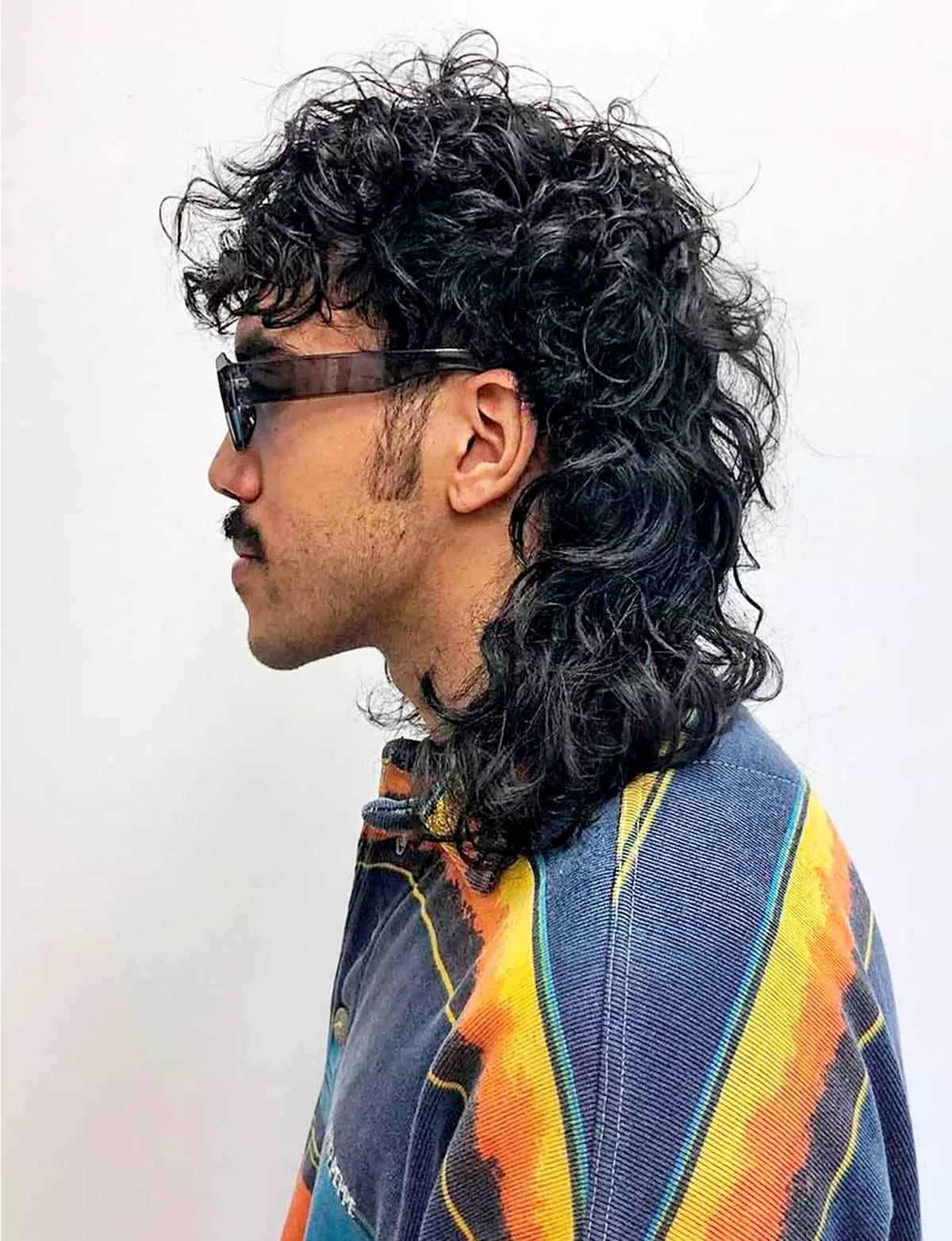 Curly Hair Wolfcut | Image: coiffeurstory