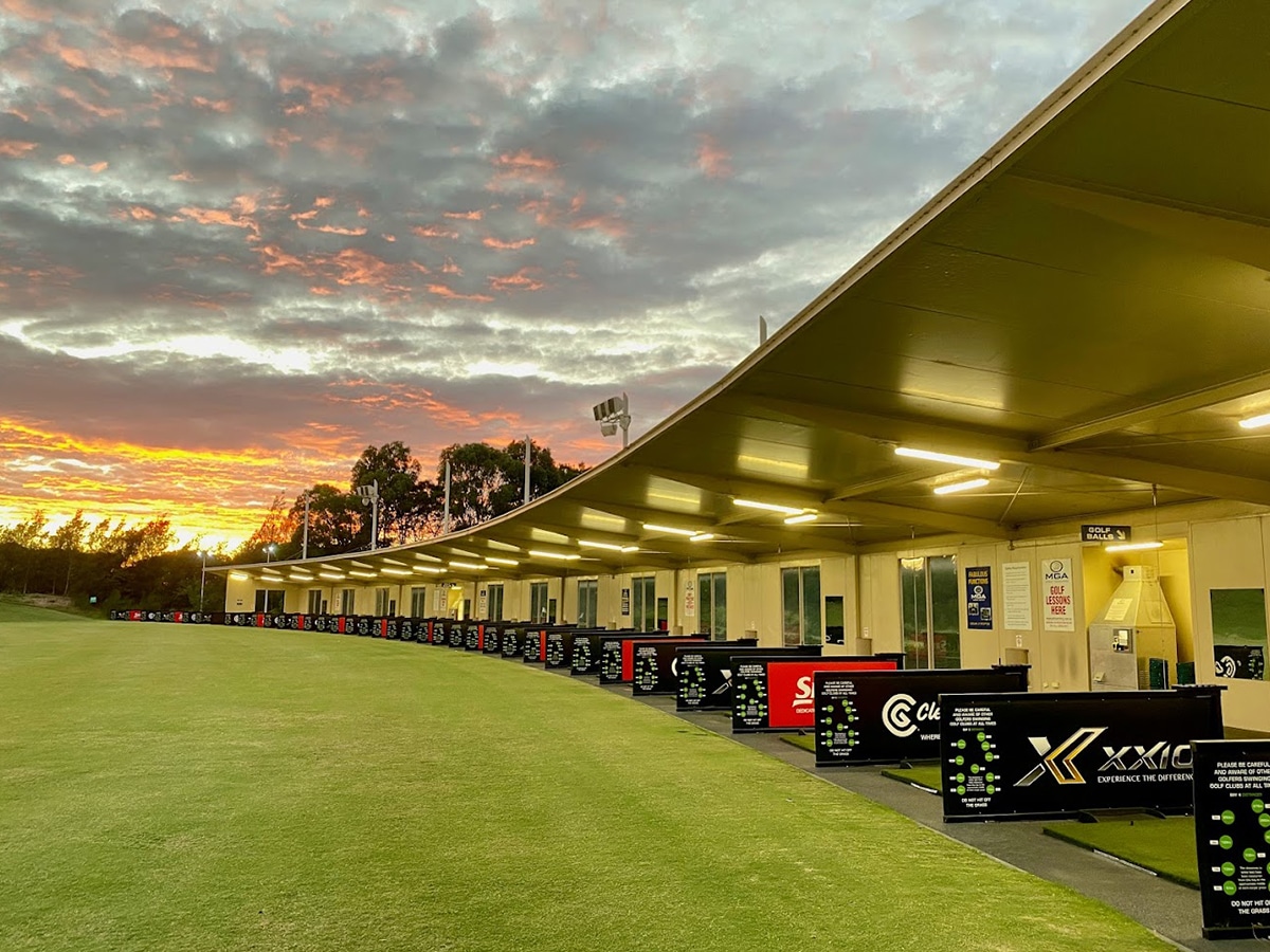 Full shot of Melbourne Golf Academy driving range at sunset