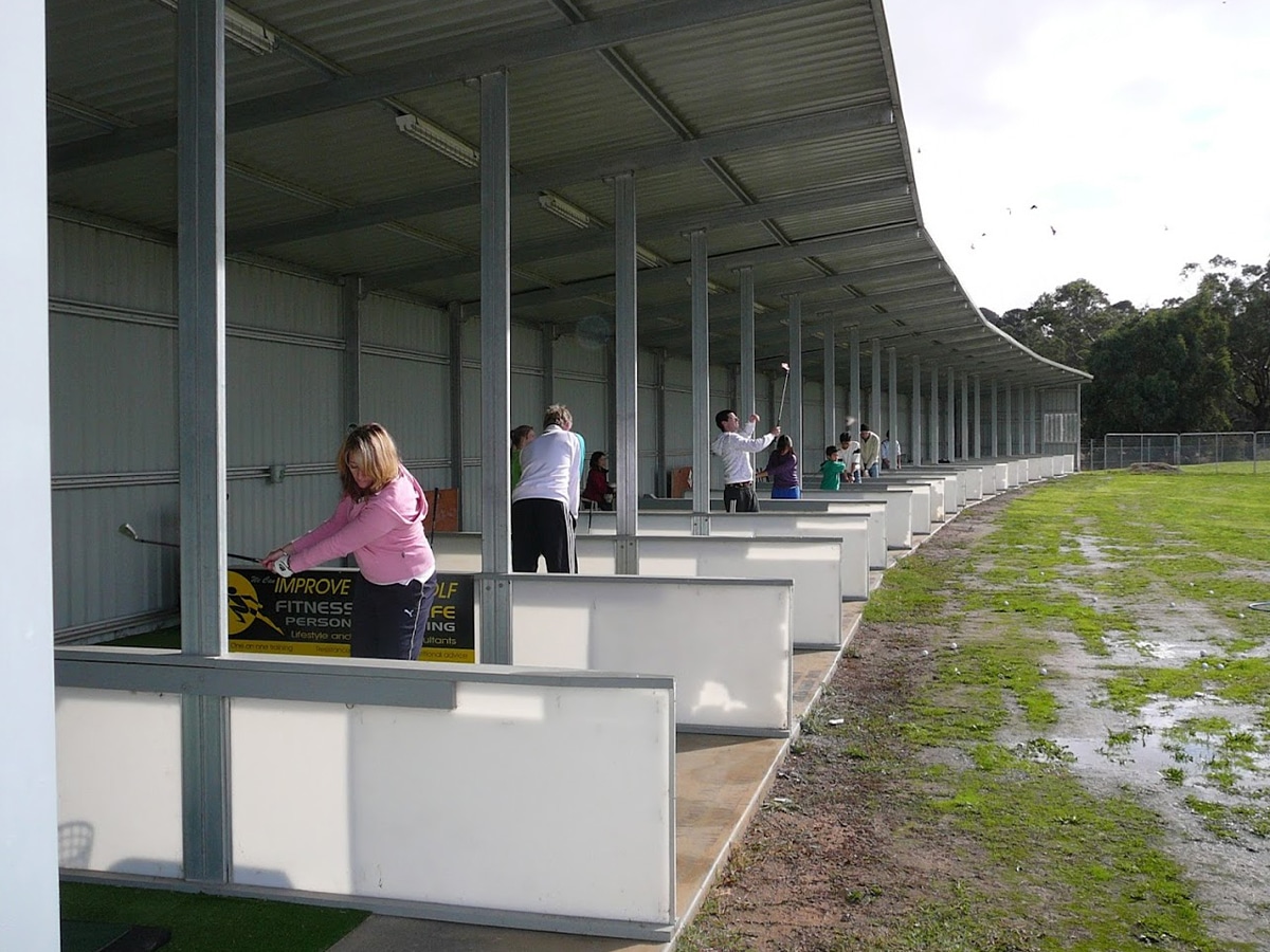 Golfers playing at the Mountain Highway Golf Range