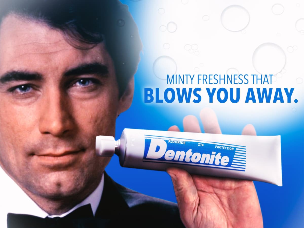 Timothy Dalton holding Dentonite Toothpaste