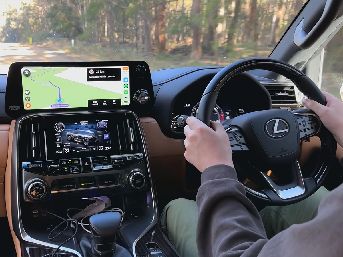 Lexus lx600 on road from drivers seat