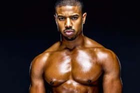 Medium shot of shirtless Michael B. Jordan