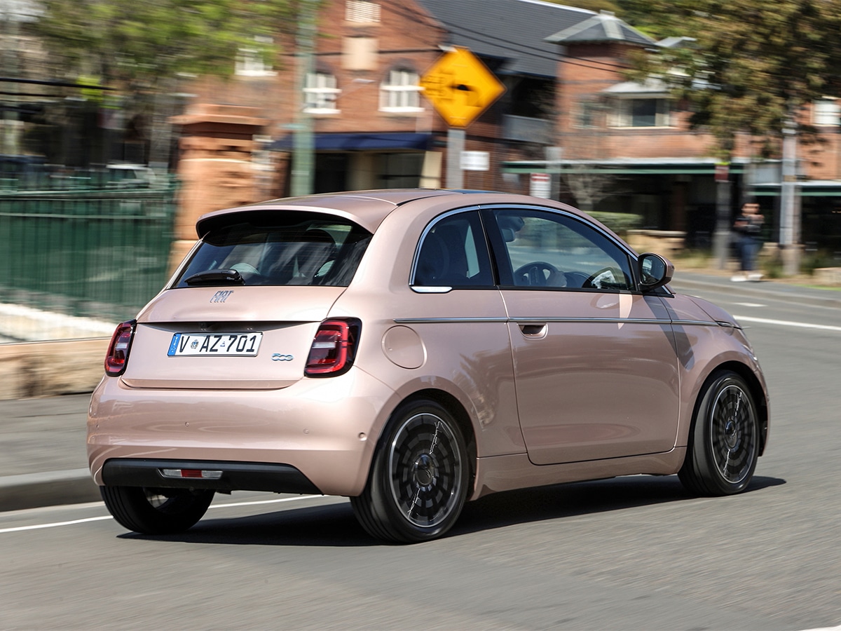 2023 fiat 500e driving from behind