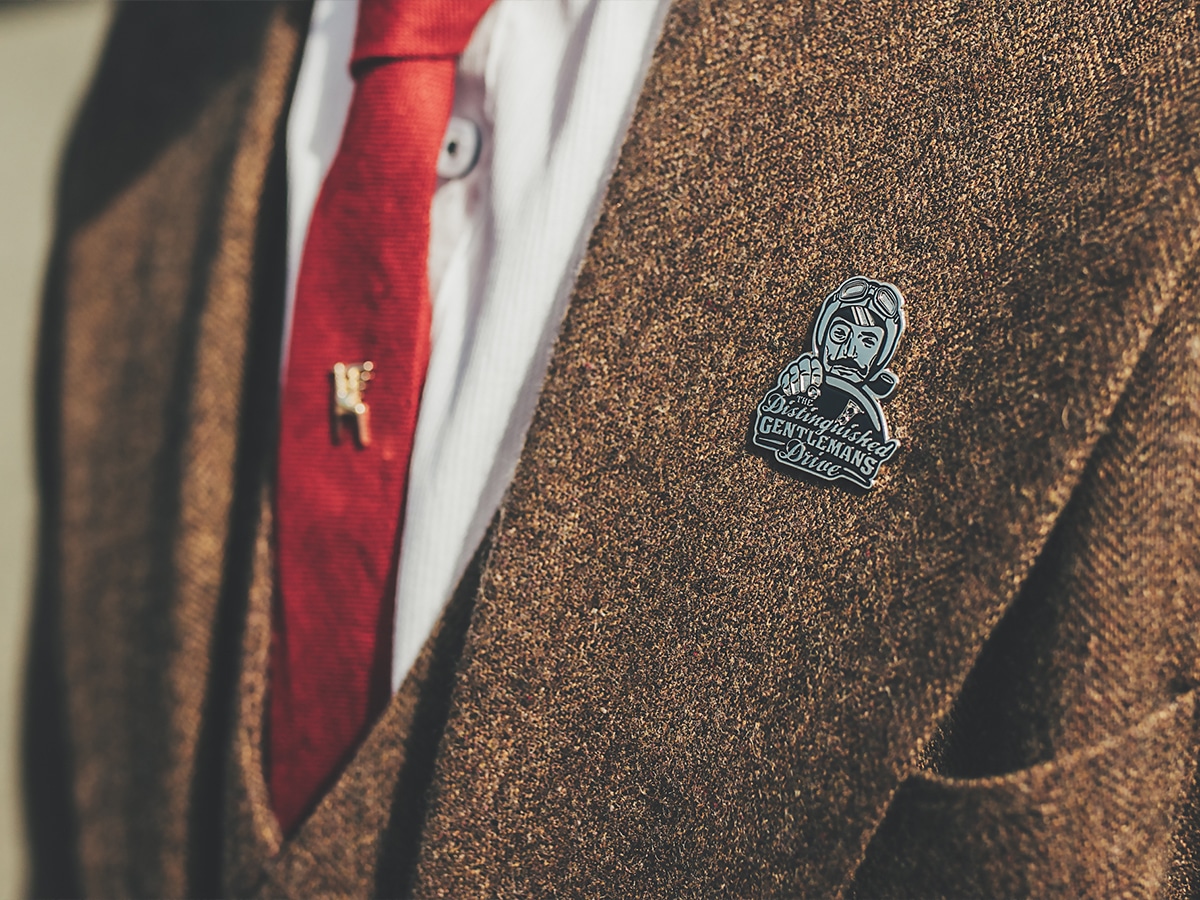 The distinguished gentlemans drive pin on jacket