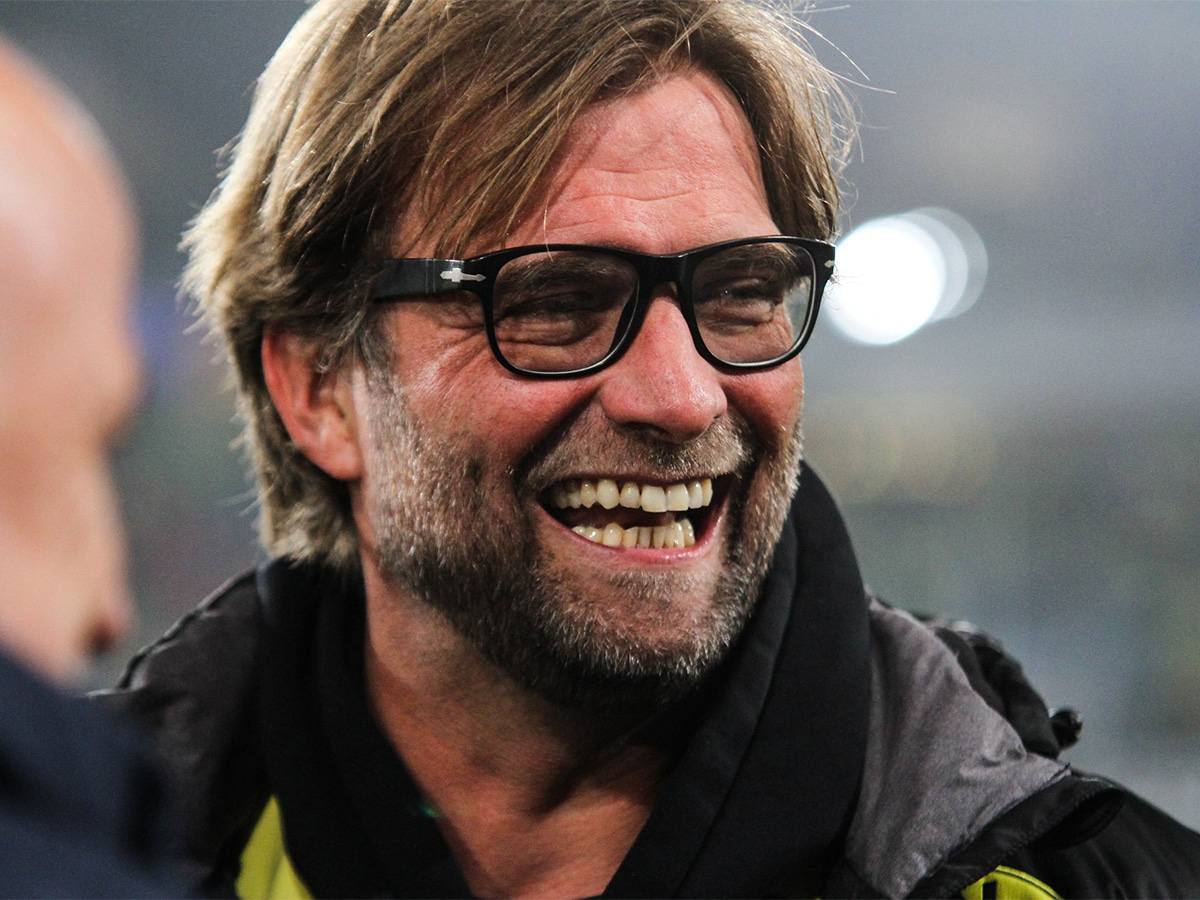 Close up of Jürgen Klopp wearing glasses smiling