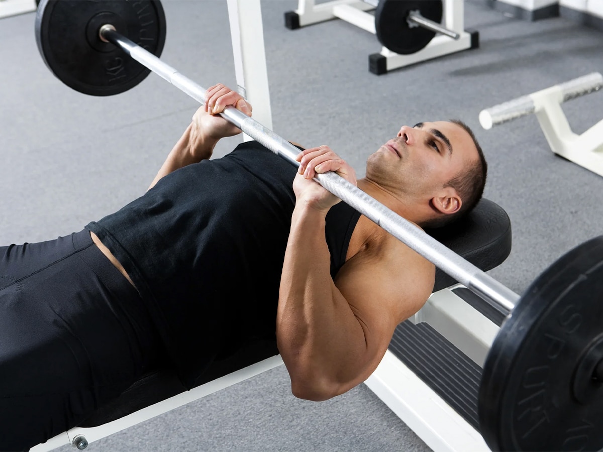 Man doing close-grip bench press exercise