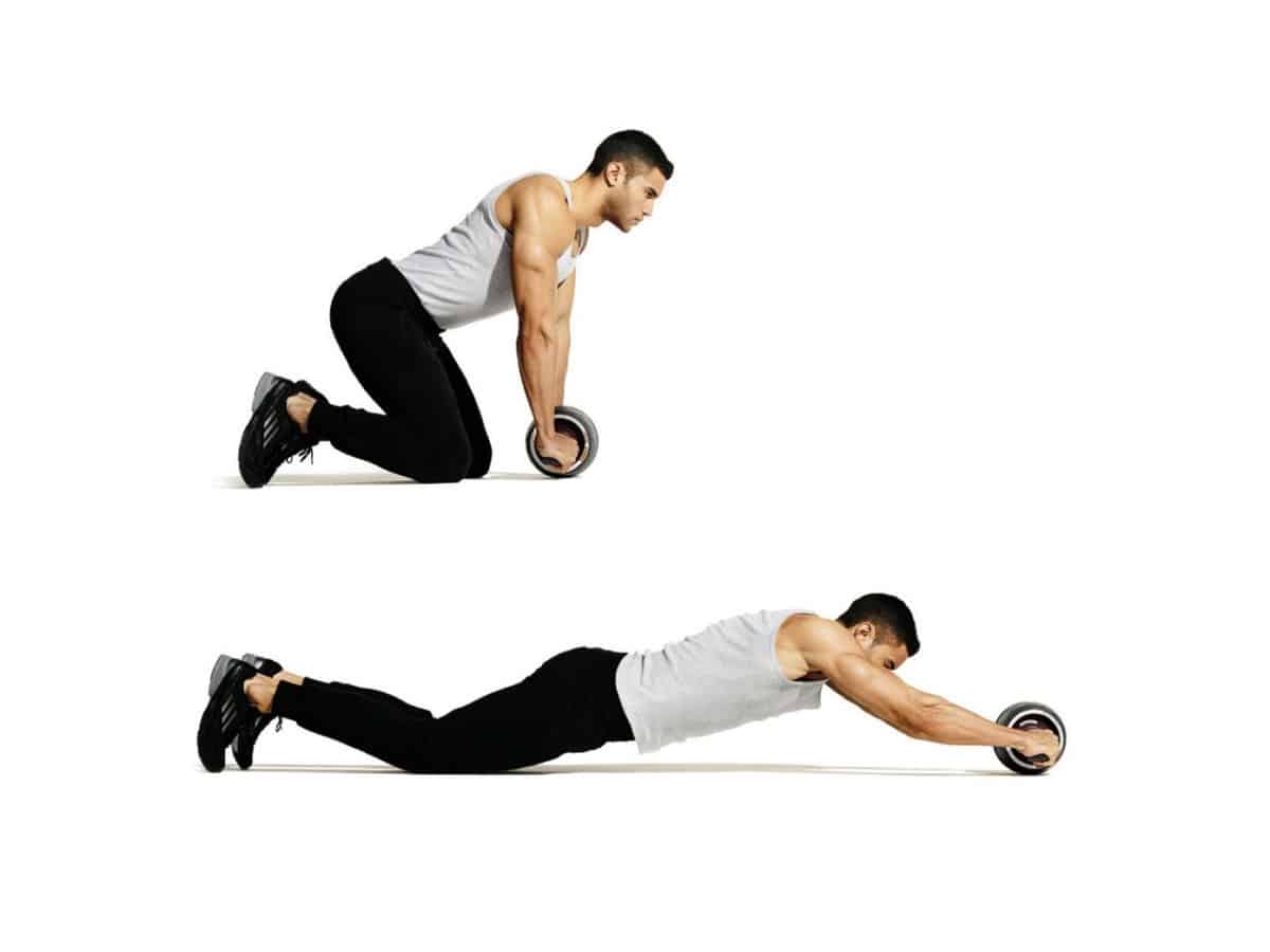 Man doing an Ab Wheel Rollout core exercise