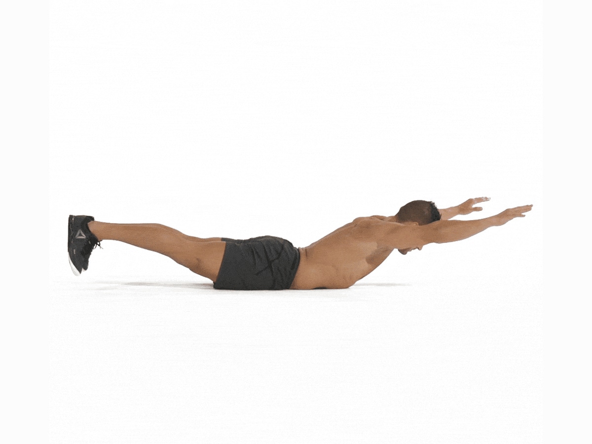 Man doing a Superman Hold core exercise