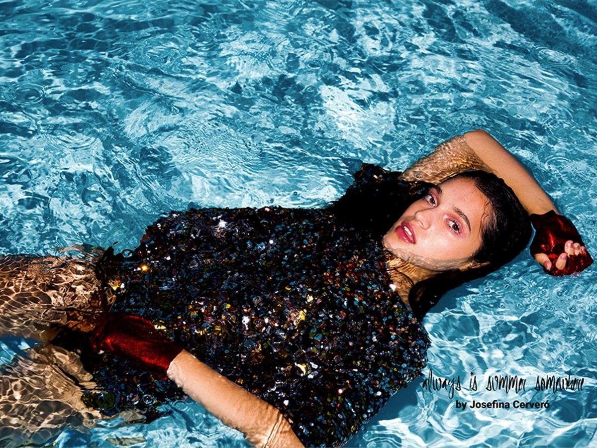 Woman in swimsuit submerged in water