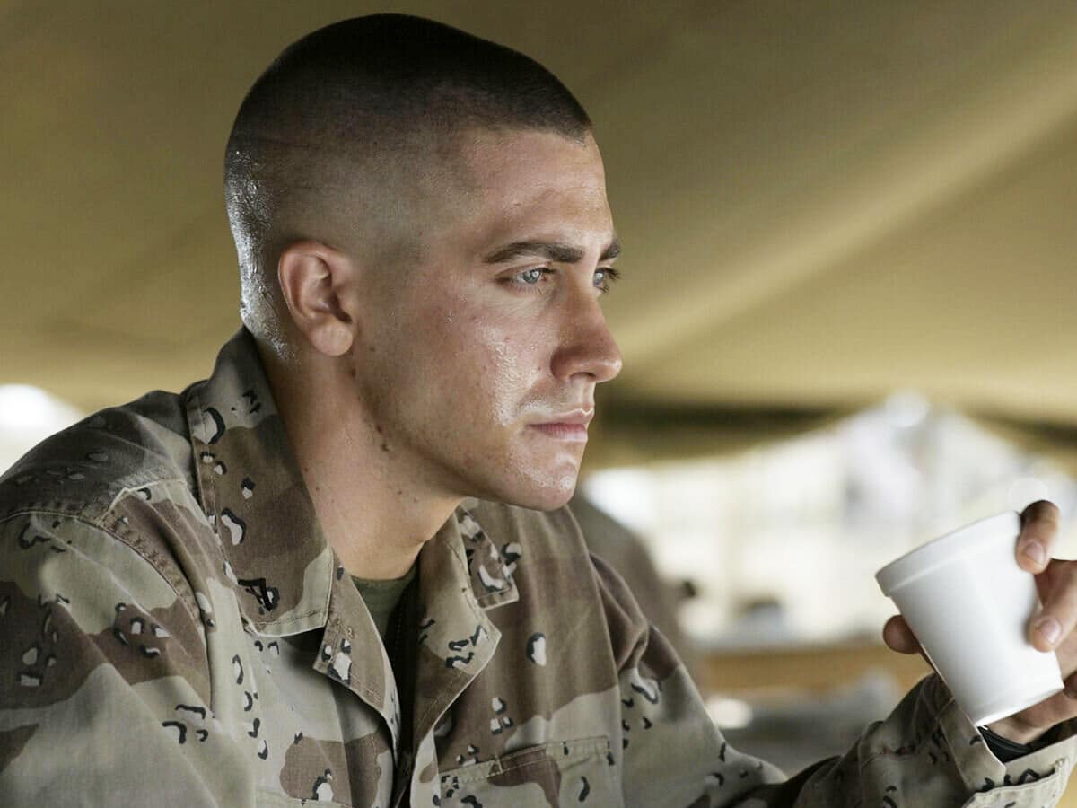 Close up side view of Jake Gyllenhaal with a Jarhead Buzz Cut