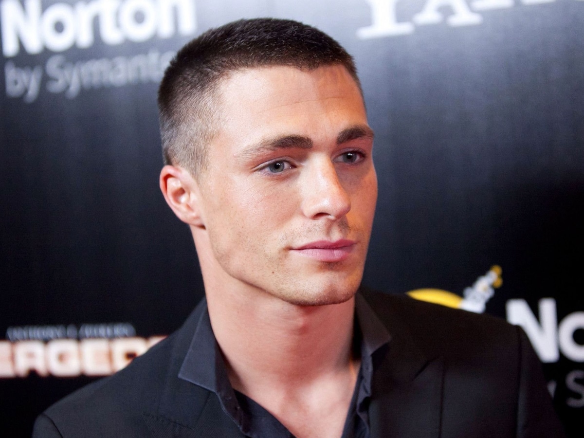 Close up of Colton Haynes with a Mid Fade Buzz Cut
