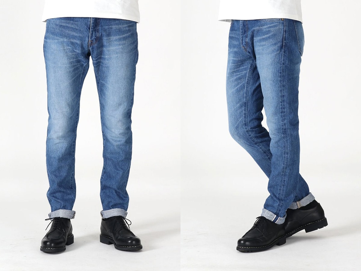 Male model wearing Japan Blue Jeans with plain white background
