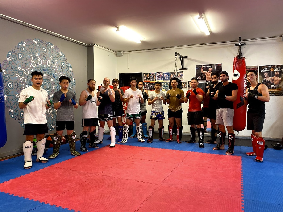 Group photo of members at Muay Thai Temple gym