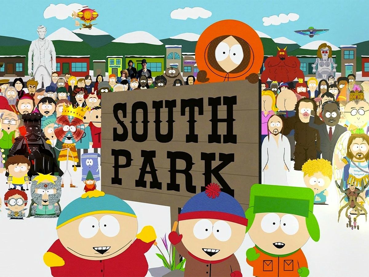 Eric, Stan, Kyle, and Kenny beside a SOUTH PARK sign with other characters in the background
