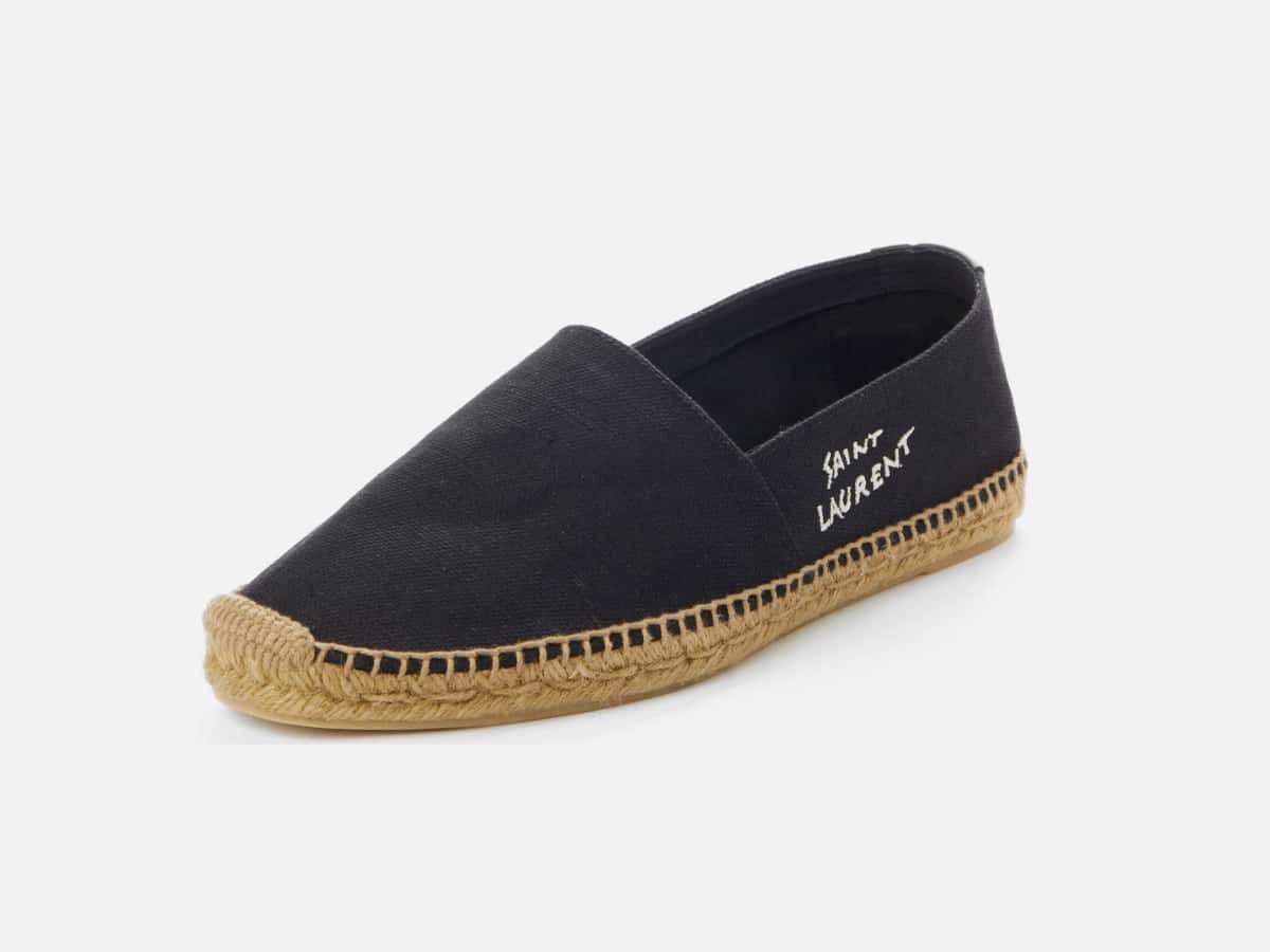Black and khaki espadrille loafers with plain white background