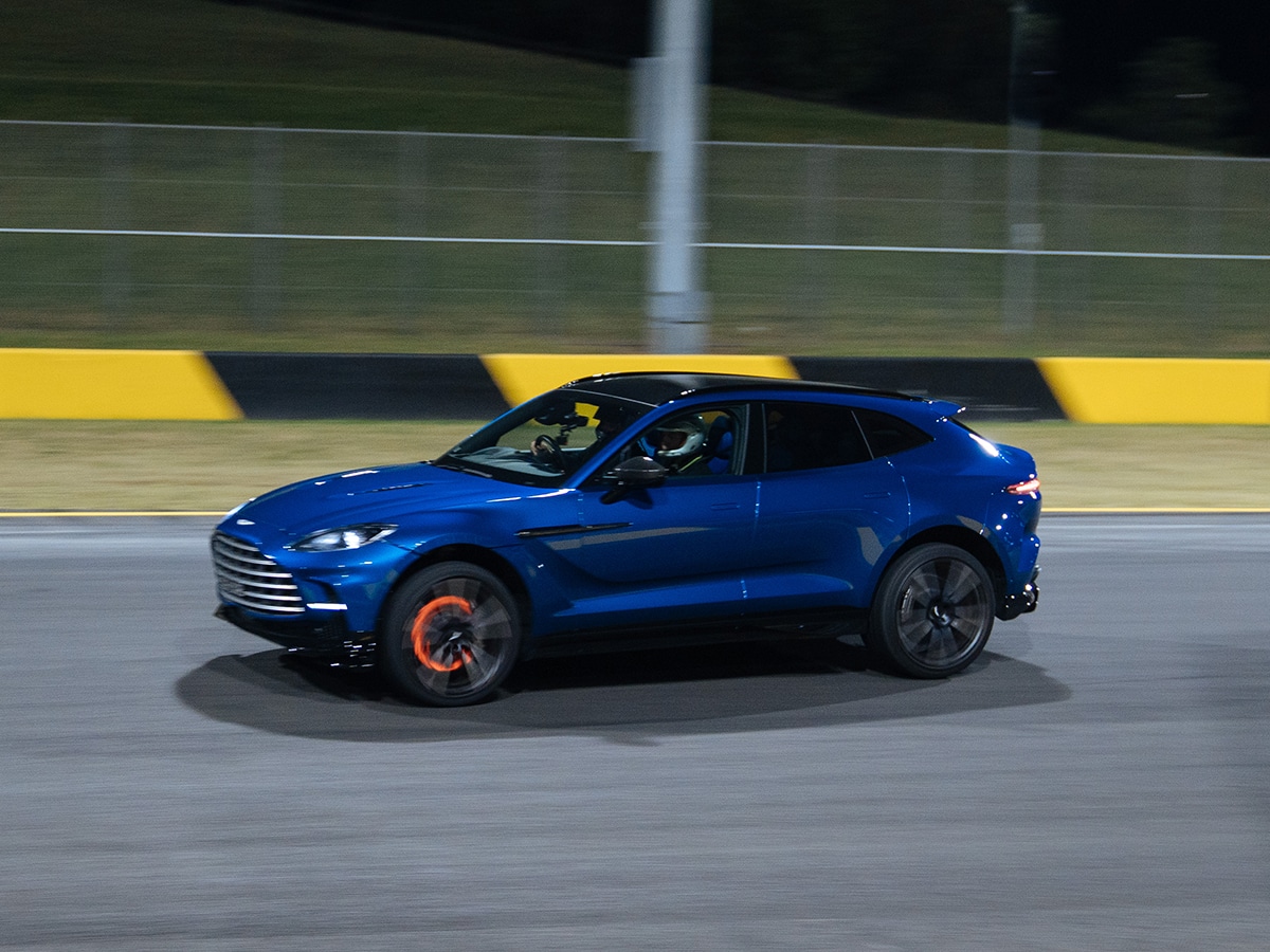 Aston martin dbx707 on track glowing brakes