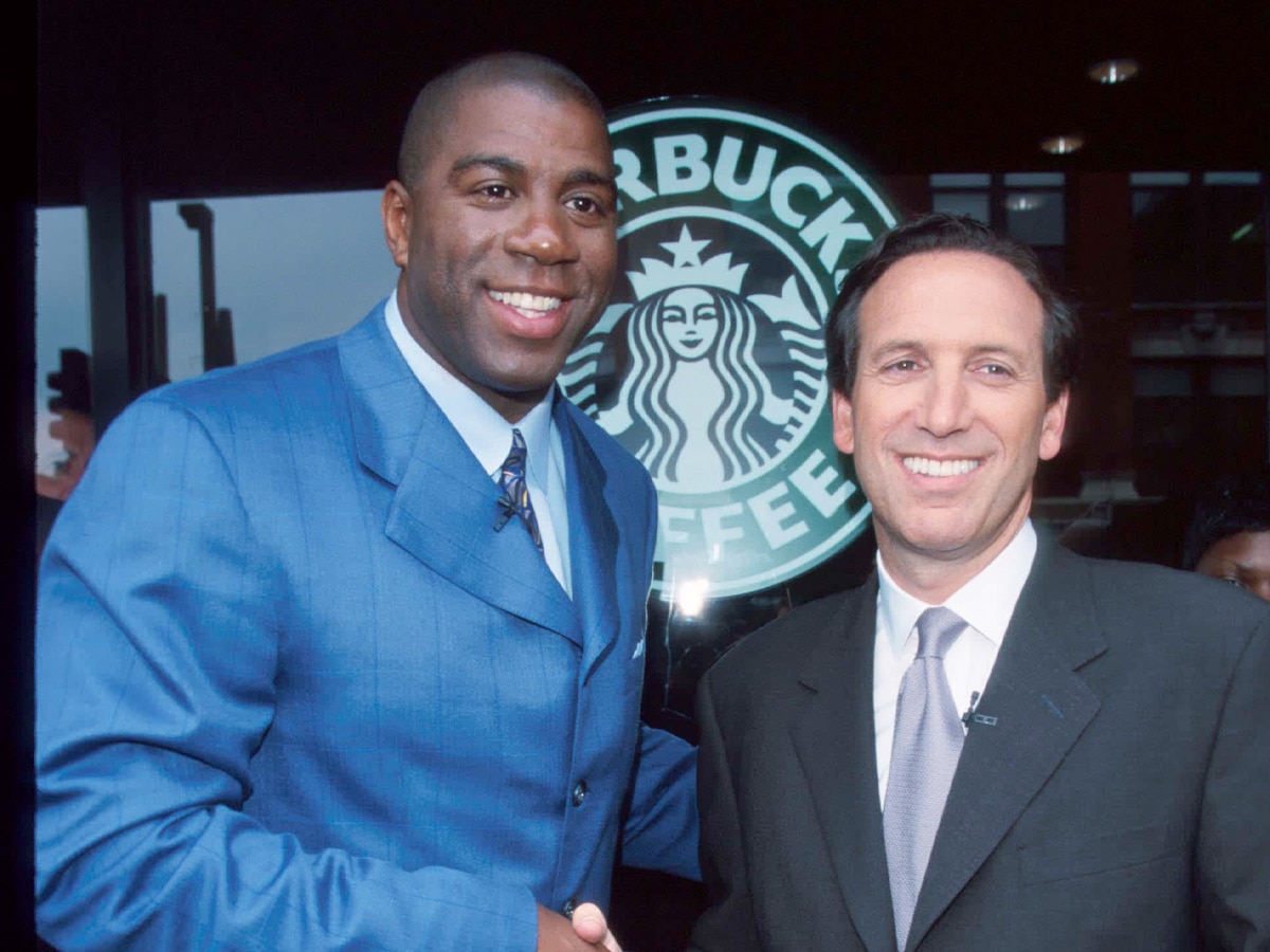 Earvin ‘magic’ johnson with starbucks ceo howard schultz in 1999evan agostini getty images sport getty images