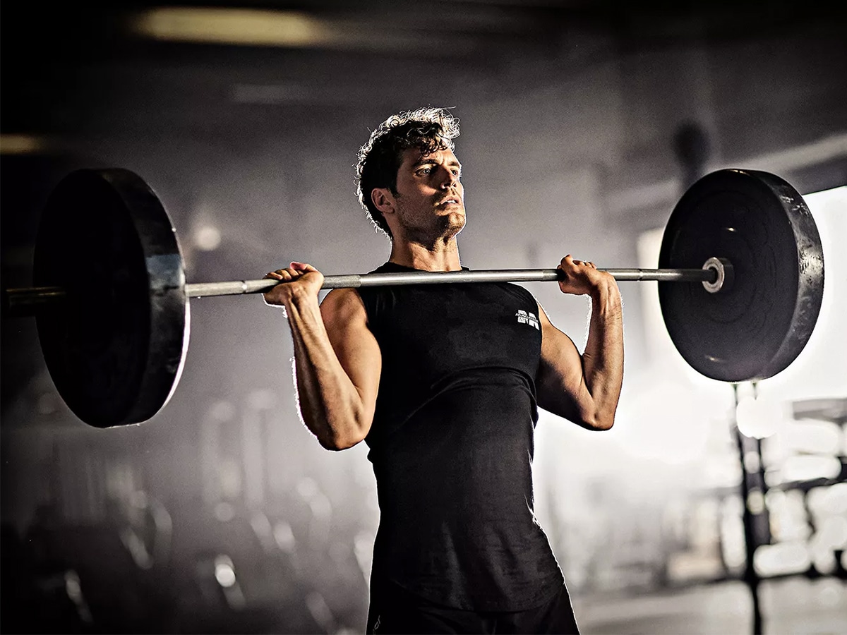 Henry Cavill lifting a barbell