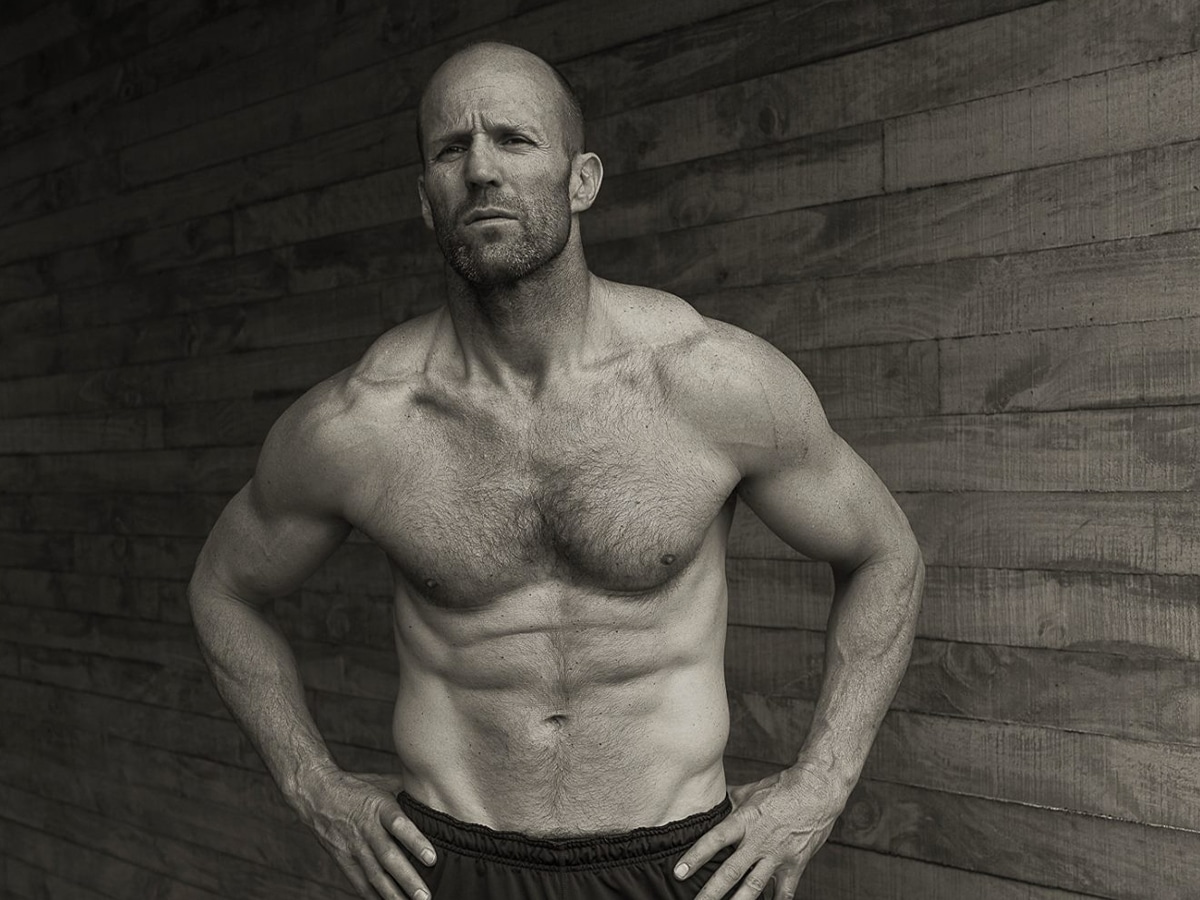 Medium shot of shirtless Jason Statham