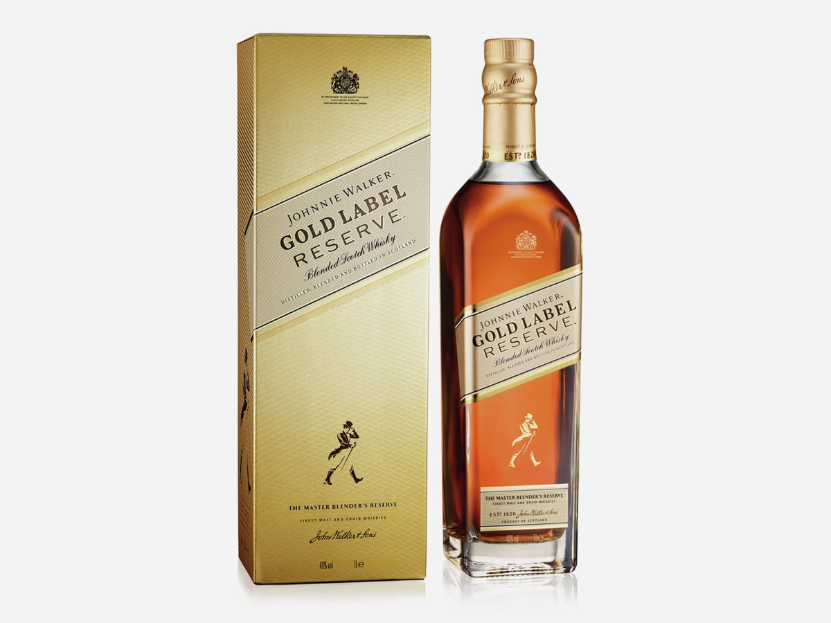 A bottle of premium whisky Johnnie Walker Gold Label Reserve and its box packaging displayed against a clean white background
