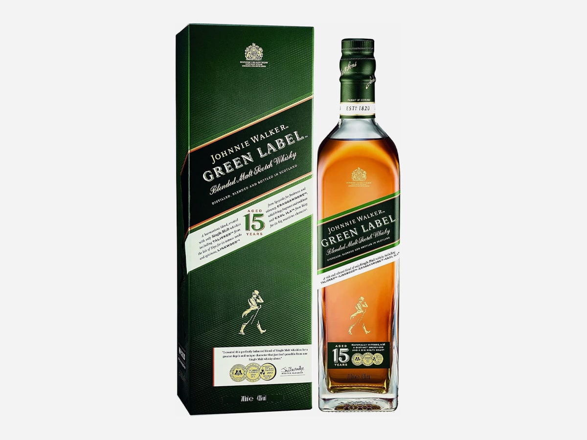 A bottle of premium whisky Johnnie Walker Green Label and its box packaging displayed against a clean white background