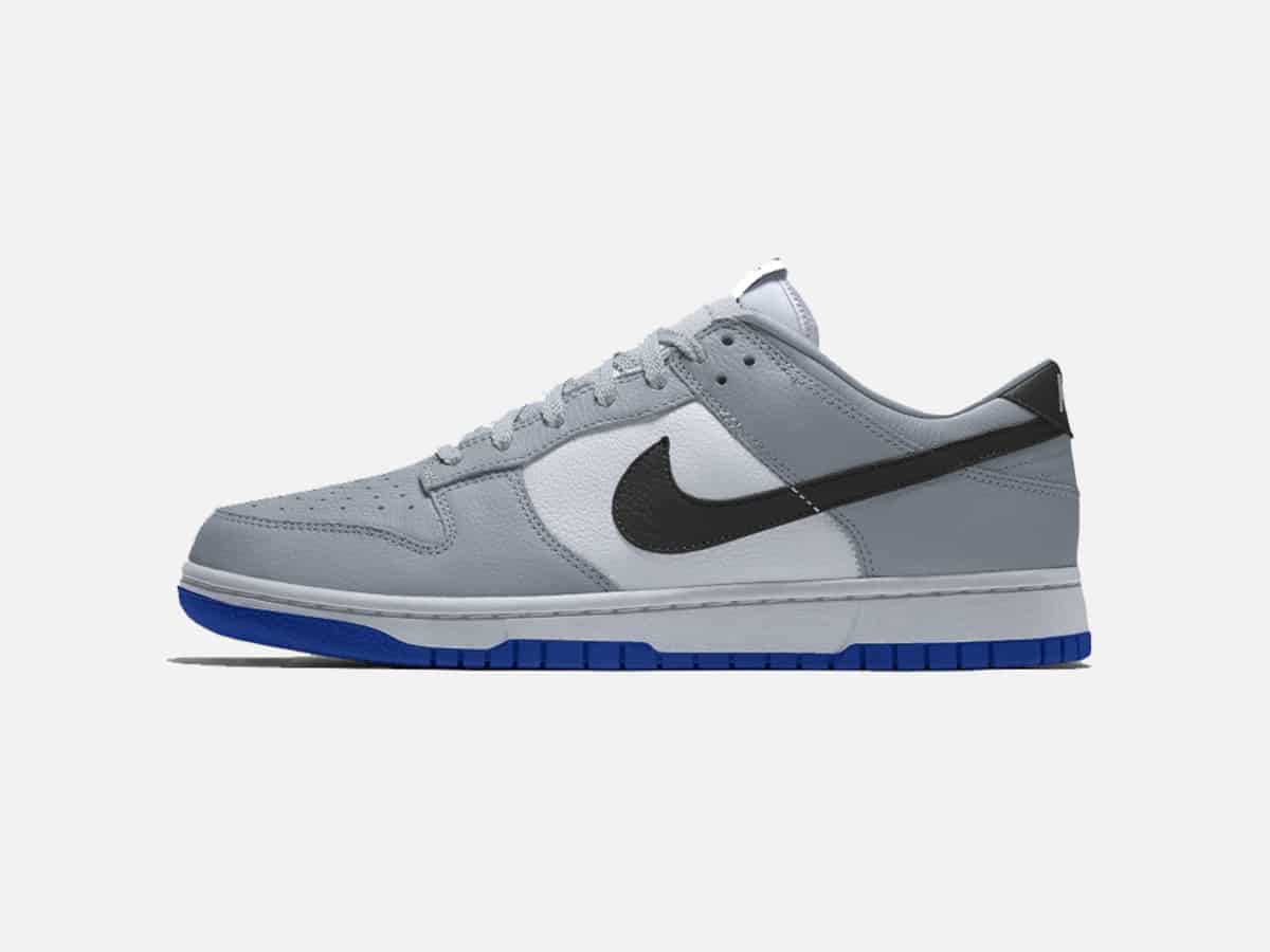 Product image of Dior Nike Dunk Low sneakers with plain white background