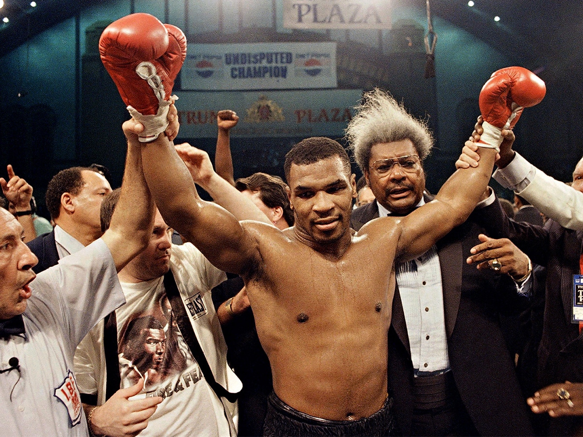 Mike Tyson celebrating victory after boxing match