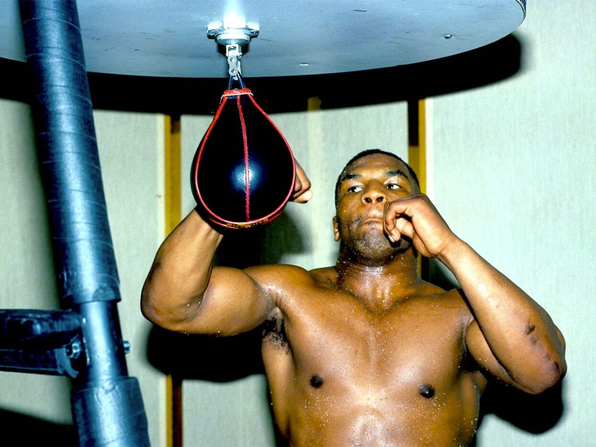 Mike Tyson striking a speed bag