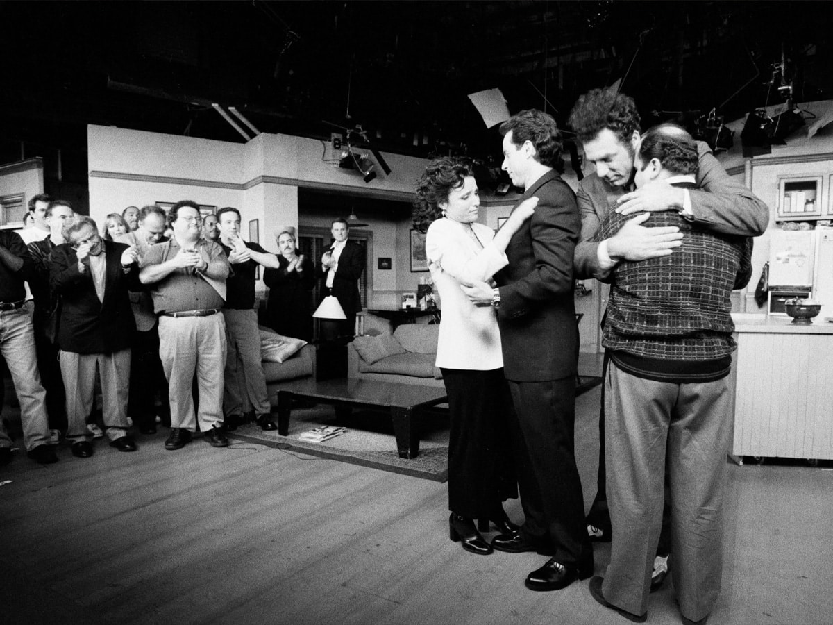 Julia Louis-Dreyfus, Jerry Seinfeld, Michael Richards and Jason Alexander embrace on the set of the show 'Seinfeld' | Image: David Hume Kennerly/Getty Images
