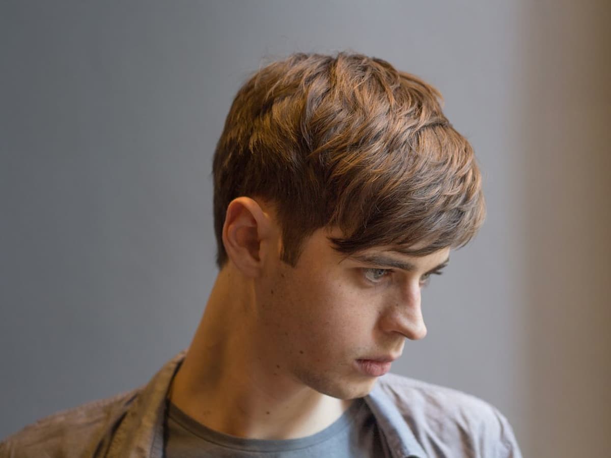 Close up of man with 4 Back and Sides haircut